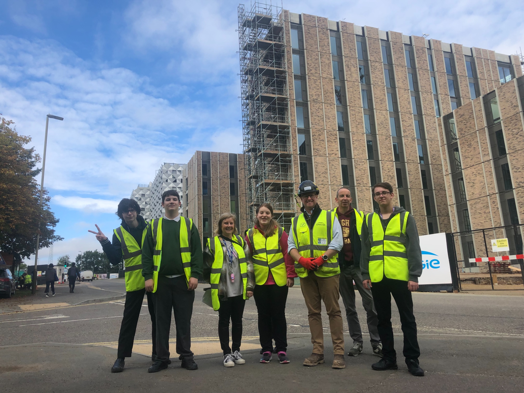 Picture of students in high vis jackets on a construction site